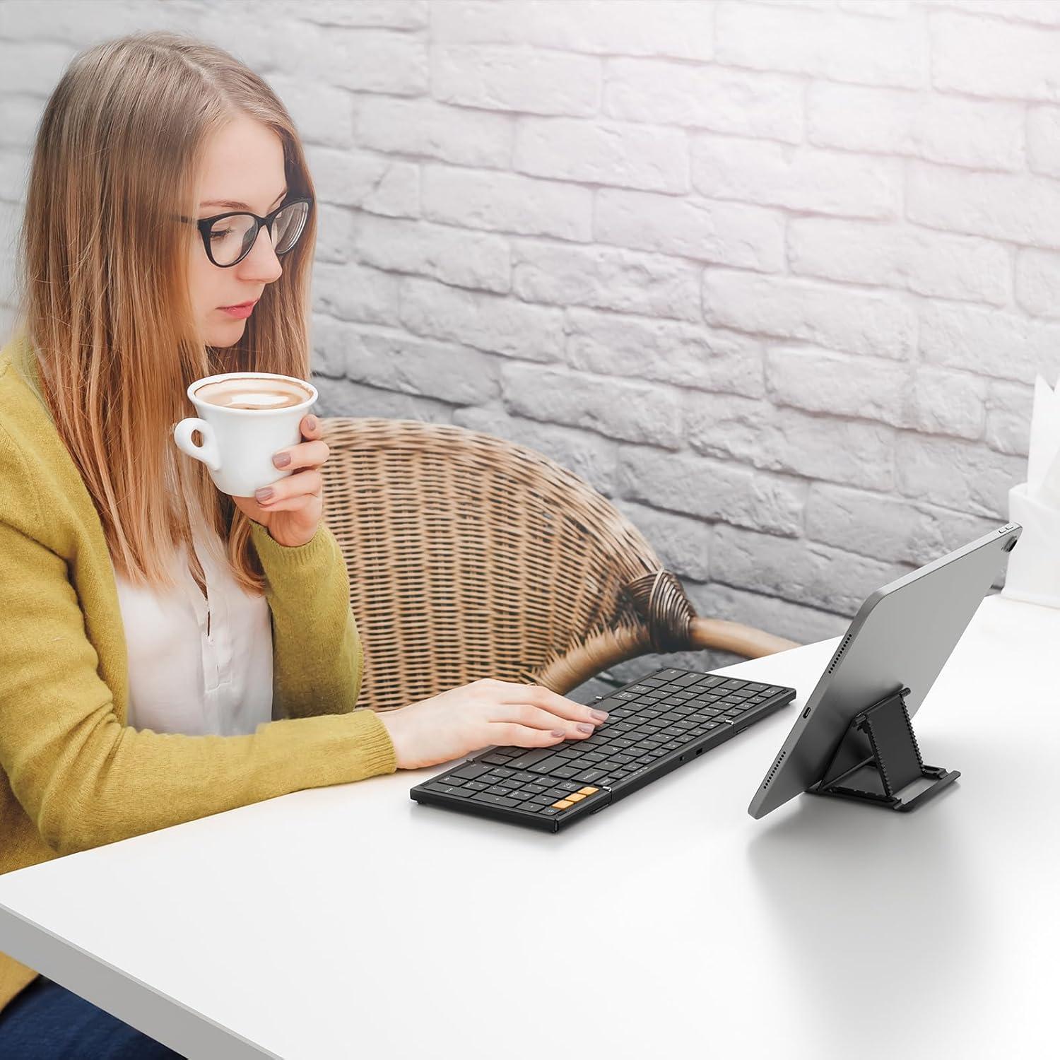 imageOMOTON Foldable Bluetooth Keyboard Supports Up to 3 Devices Rechargeable Wireless for iPad iOS Android Tablet MacOS Windows Laptop PC Full Size Folding Travel KeyboardBlackUS Layout